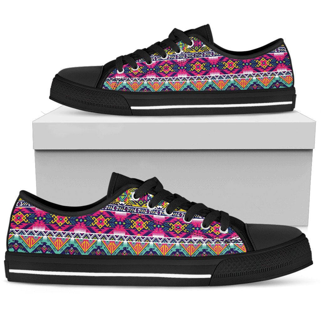 Low top canvas sneakers with colorful geometric Native-inspired stripe design, black sole