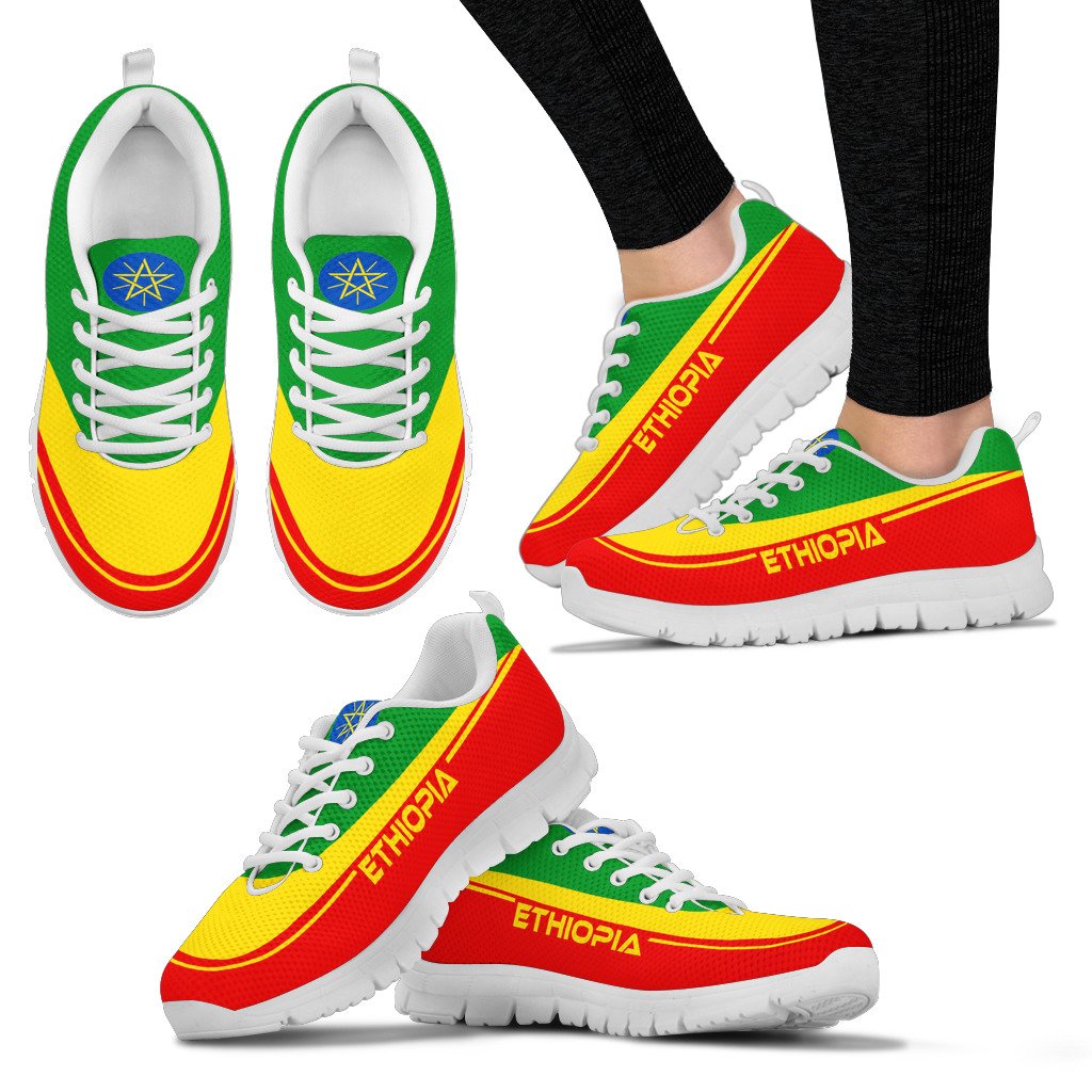 Pair of Ethiopia sneakers with tricolor panels, white sole, blue crest on tongue
