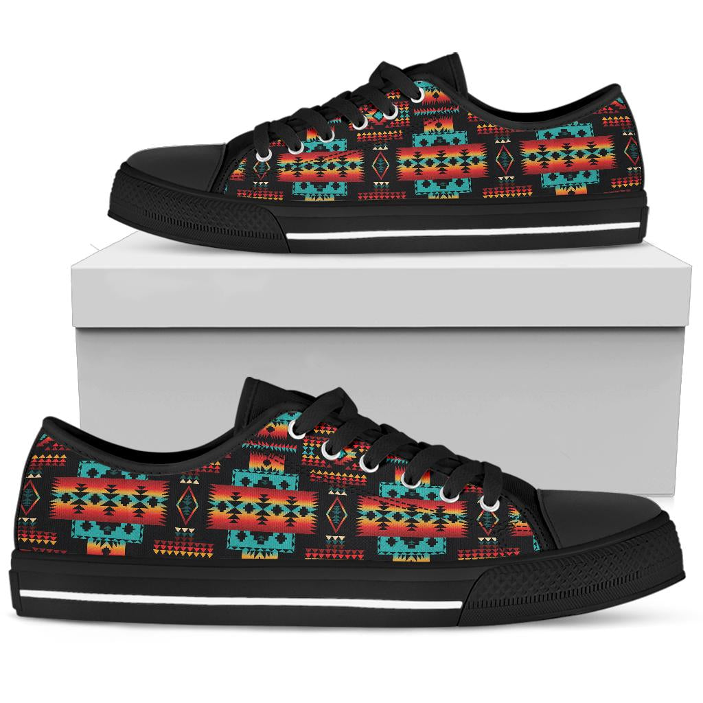 Low-top sneakers with multicolor Native pattern, black laces and black rubber sole.