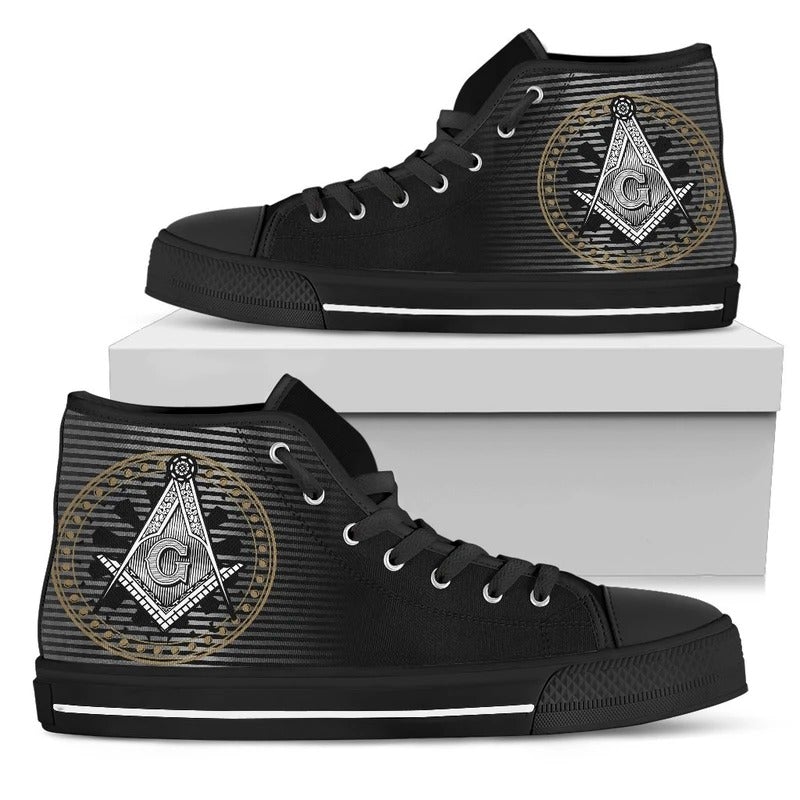 Black high-top sneakers with gold-and-white emblem print on side, black laces