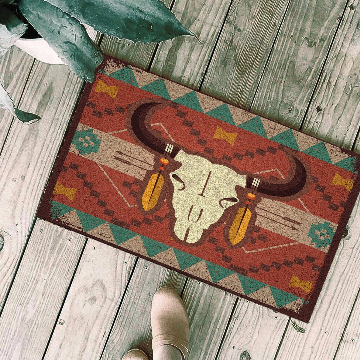Bison skull graphic doormat with red background and green geometric borders