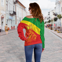 Women off-shoulder sweater back view, crowned lion on green/yellow/red