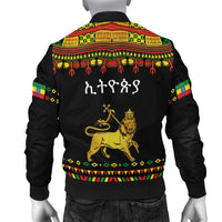 Black bomber jacket back with gold lion graphic and multicolor patterned yoke
