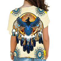Back view: multicolor women’s cross-shoulder shirt with big blue thunderbird print