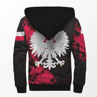 Back view: red-and-black sherpa hoodie with white eagle emblem and hood