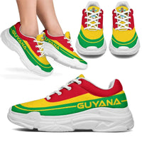 Guyana flag chunky sneakers: red/yellow/green panels, white laces, thick white sole