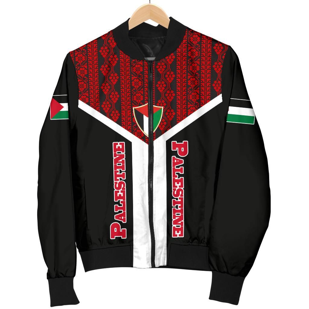 Black bomber jacket on hanger, red patterned yoke, white chevron, Palestine sleeve text