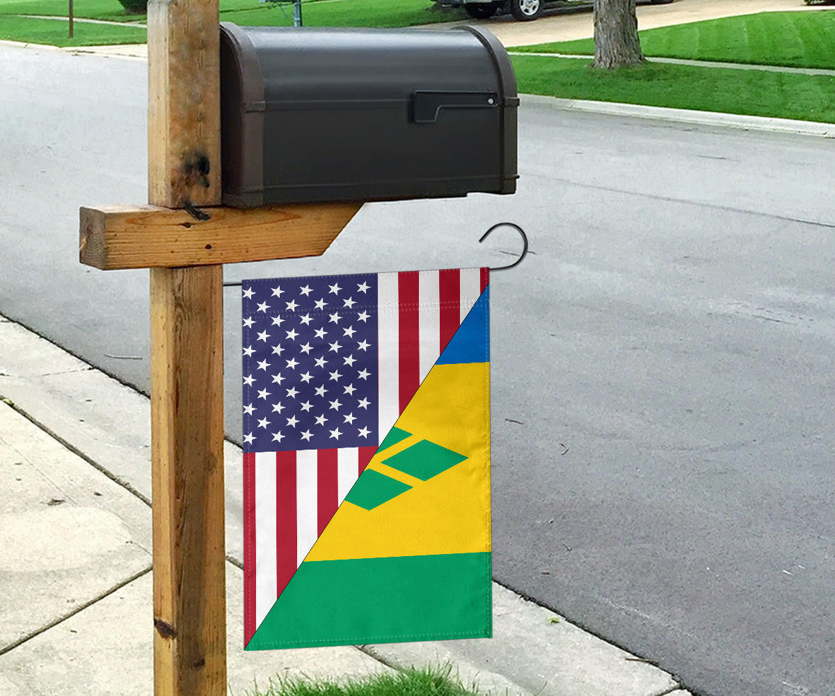 Flag on a wooden post with US stars and stripes plus Saint Vincent diagonal colors