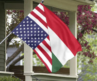 US and Hungary flag draped from a hook on a porch, diagonal red and green-white-red sections