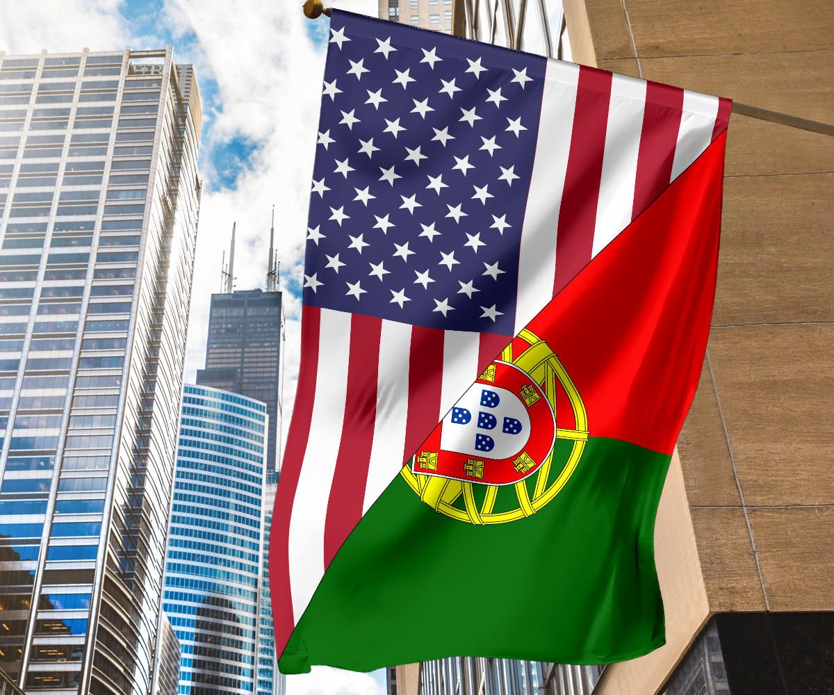 US and Portugal house flag blowing, stars on blue with Portugal crest in green