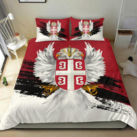 Red and white bedding set with large winged eagle shield graphic and matching pillows