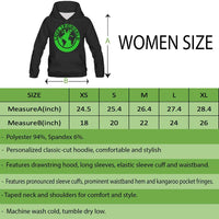 Black hoodie women size chart; green circular emblem on chest, drawstring hood