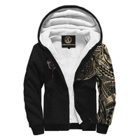 Black zip-up sherpa hoodie with white plush hood lining and gold tribal print on sleeve