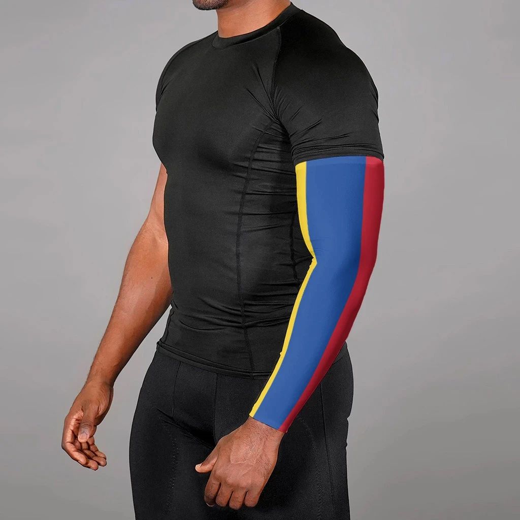 Flag-style arm sleeve on arm over black shirt; blue/yellow with red edge