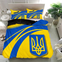 Blue and yellow bedding set with Ukrainian trident shield and striped pillowcases