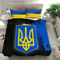 Flag-style bedding set with blue, yellow and black Ukrainian emblem, shown on bed