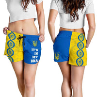 Model wearing blue shorts with yellow DNA panel, elastic waistband, drawstring