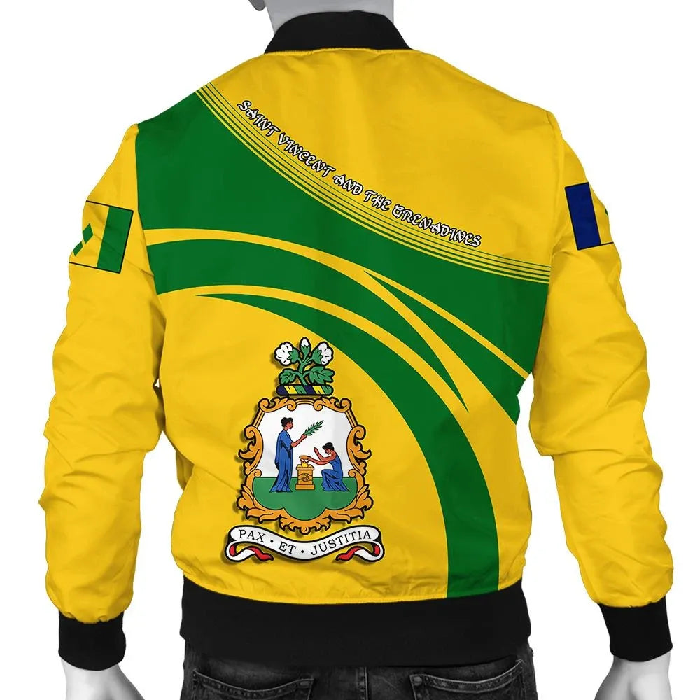Yellow bomber jacket with green diagonal panel, crest graphic on back, black ribbed hem