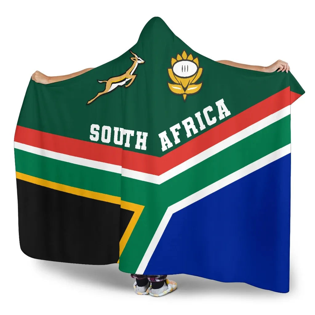 Green hooded blanket front view: South Africa text, rugby emblem, red/white/blue stripes.