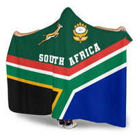 Green hooded blanket front view: South Africa text, rugby emblem, red/white/blue stripes.