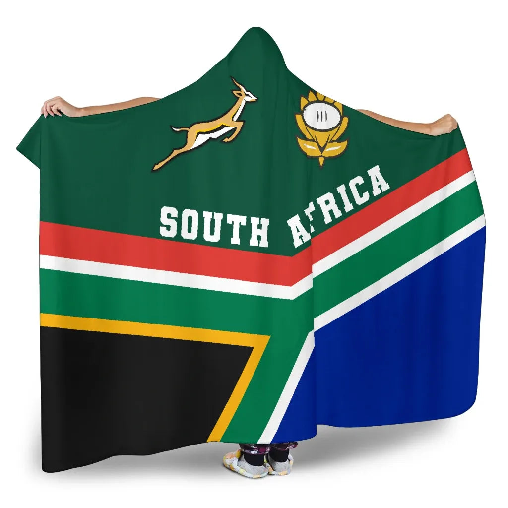 Green hooded blanket draped with South Africa lettering, rugby ball emblem, chevrons.