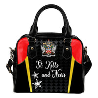 Black shoulder handbag with red sides, yellow stripes, top handles, crossbody strap