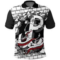 Black polo shirt with black collar, white body, bold eagle-style graphic, red accents