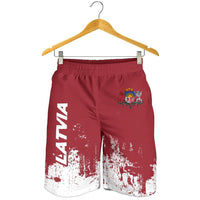Men's maroon shorts with elastic waistband, Latvia crest and white splatter print