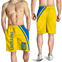 Men's yellow Ukraine shorts with blue diagonal panel, trident crest and elastic waistband