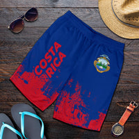 Faltansicht Herren-Shorts: blau mit rotem Spritzdruck und Costa-Rica-Wappen vorn