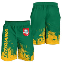 Green swim shorts with yellow graphic splatter and Lithuania crest, elastic waistband