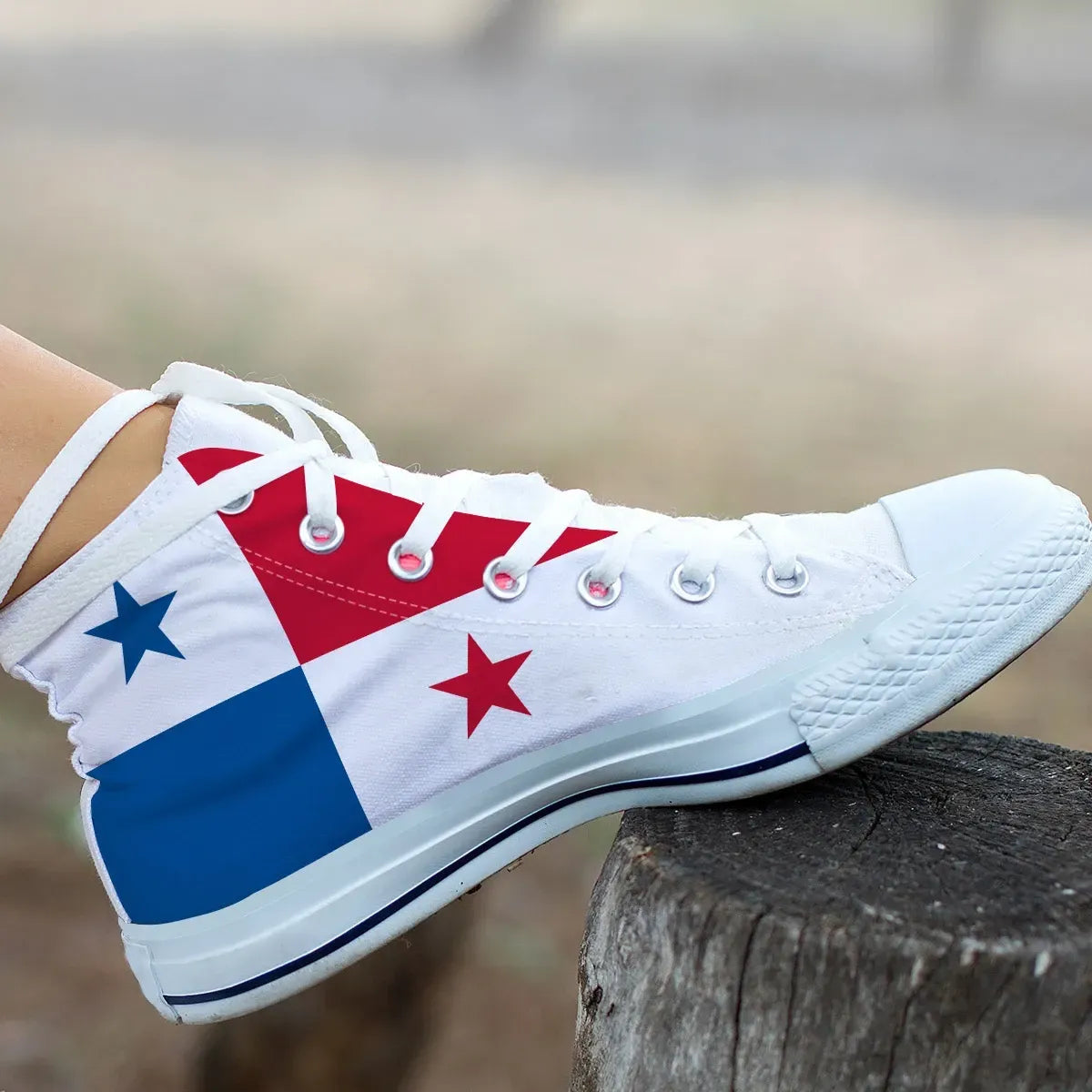 White canvas high-top sneakers with Panama flag print, stars, and lace-up front