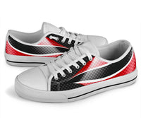 White low top sneakers, angled front with red stripe, black checkered pattern