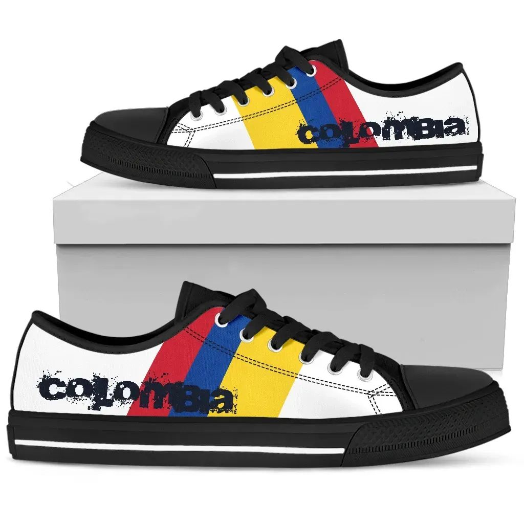 Colombia flag canvas low-top sneakers, black sole, black laces, front view