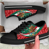 Low-top Mexico flag print sneakers, black base with coat of arms on red-and-green panels