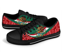 Low-top lace-up sneakers, black base, Mexico coat of arms on red-and-green stripe