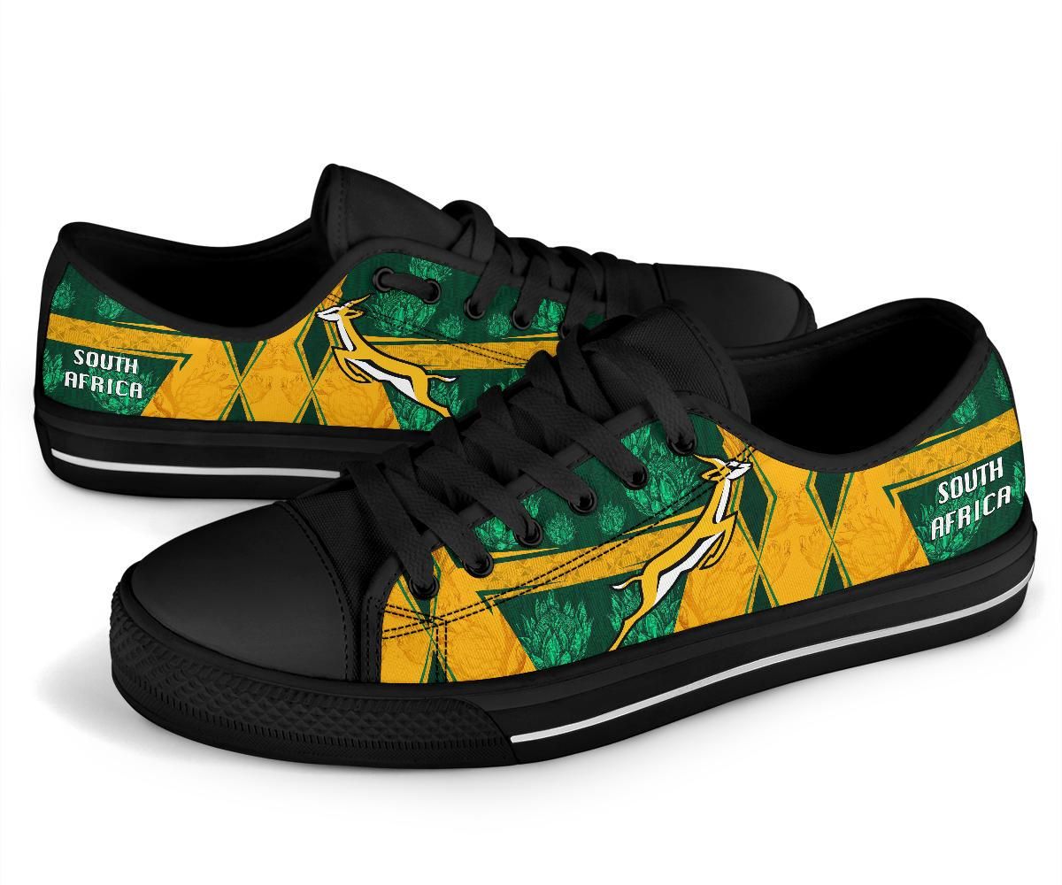 South Africa low-top shoes, black sole; front view with springbok logo and 'SOUTH AFRICA'