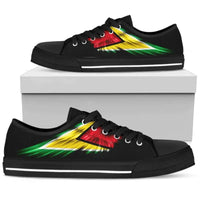 Black low-top sneakers with colorful wing graphic and white side stripe, lace-up