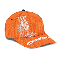 Orange cap side view with lion illustration and white Koningsdag text on brim