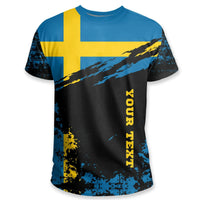 Sweden flag graphic T-shirt, black/blue with yellow cross, diagonal stripe, splatter print