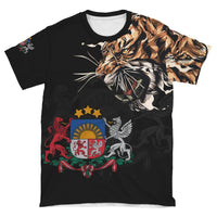 Black crew-neck T-shirt flat lay with tiger head and Latvia-style crest graphic