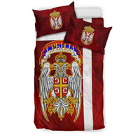 Serbian crest duvet cover in red with white stripe and two red pillows, eagle badge