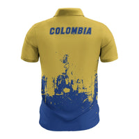 Men's all-over print polo shirt, back view with “COLOMBIA” text and blue splatter print