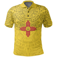 Yellow Aztec polo with red sun face emblem, short sleeves, button collar.