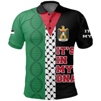 Green, red, black polo shirt with crest and 'IT'S IN MY DNA' graphic on front