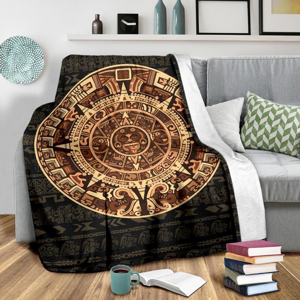 Dark Mayan-style blanket with oversized circular sun emblem and tree of life graphic
