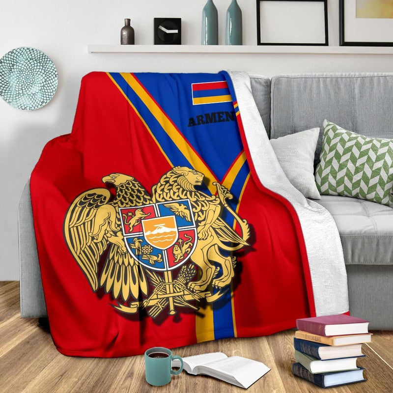 Red Armenia premium blanket with gold lion-and-eagle crest and blue stripe