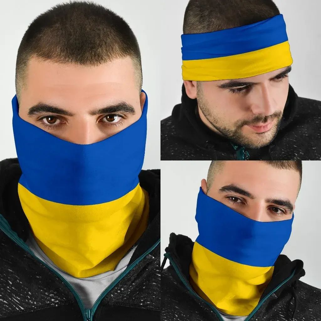 Ukraine flag neck gaiter bandana in blue and yellow, worn over face and neck