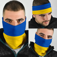 Ukraine flag neck gaiter bandana in blue and yellow, worn over face and neck
