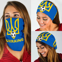 Blue Ukraine soccer bandana worn over head with yellow trident and football emblem